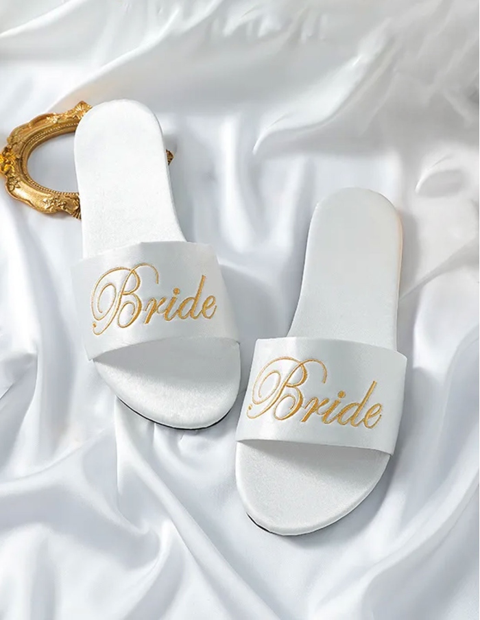 White bride slippers with gold embroidery
