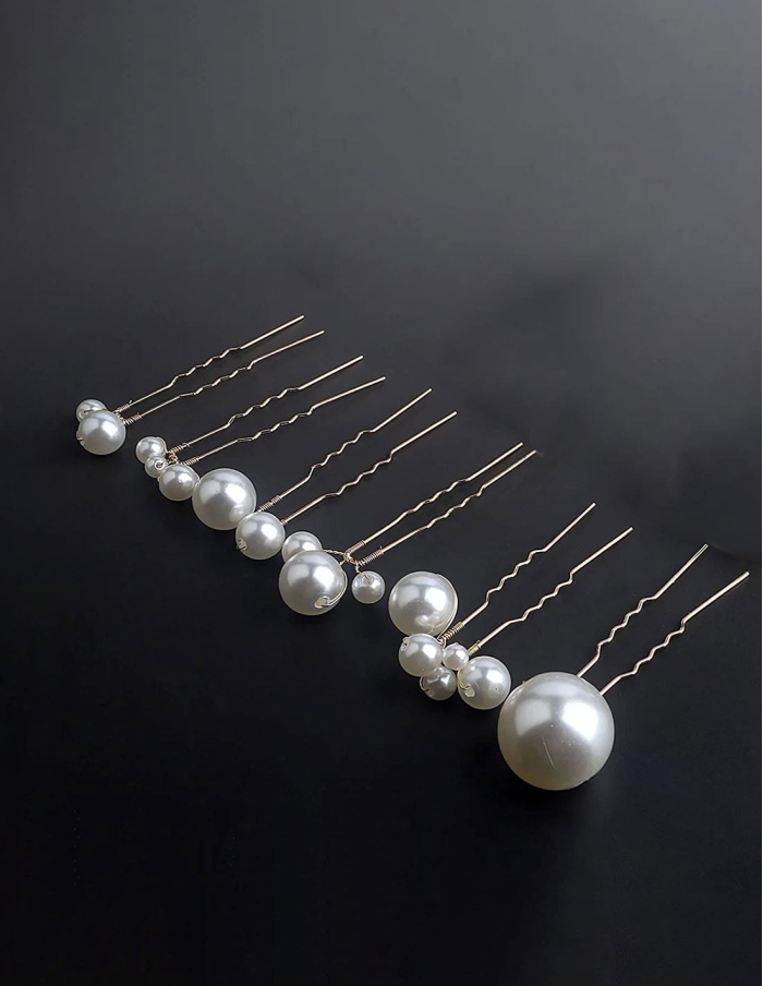 Set forcine assortite con perle in varie dimensioni